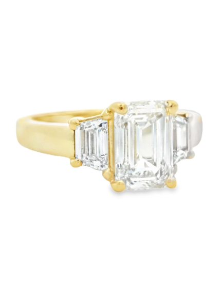 Emerald and Trapezoid Three-Stone Ring