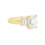 Emerald and Trapezoid Three-Stone Ring - Image 2